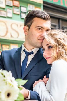 newlyweds sitting in the Cafe at the table