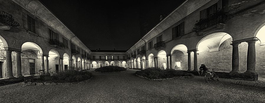 ancient courtyard in Varese city in a winter evening