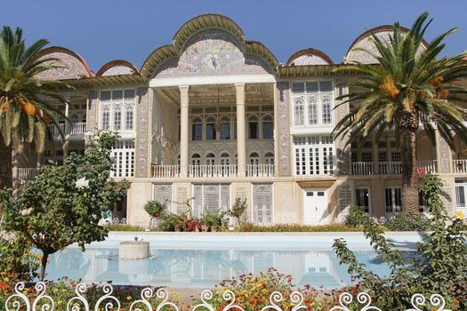 SHIRAZ, IRAN - OCTOBER 7, 2016: Beautiful palace within the Eram Garden on October 7, 2016 in Shiraz, Iran, Asia