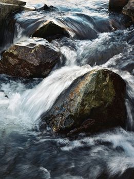 nature background Wild water between stones