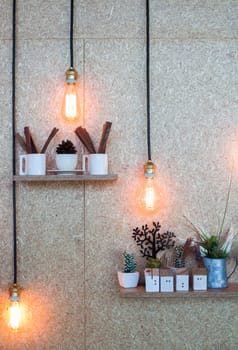 Vintage lighting decorated on brown background, stock photo