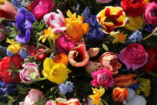 Colorful mixed bouquet with various spring flowers