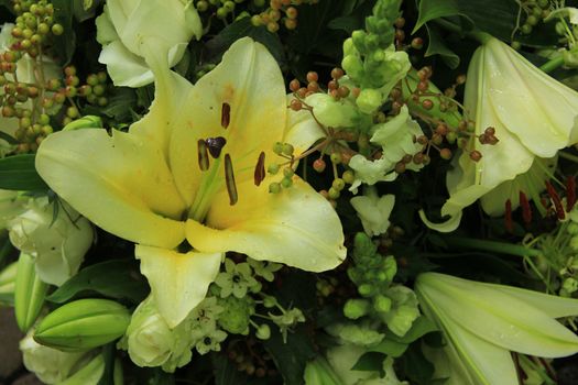 yellow tiger lily in a bridal arrangement