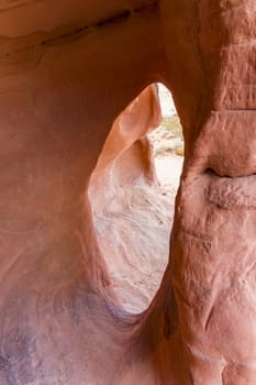 Looking through a rock formation in the Valley of Fire, Nevada