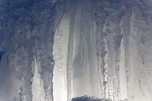 Icicles illuminated blue in Minnesota