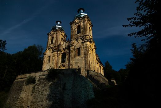 The Church of the Visitation at the full moon.
In the extinct village Skoky - Maria Stock - on-site chapel with miraculous painting of the Virgin Mary was in the years 1736 - 1738 built a large Baroque church - The Pilgrimage Church of the Visitation. Last repaired in the 1903, ruined after 1945. In the early 21st century repeatedly plundered and devastated.