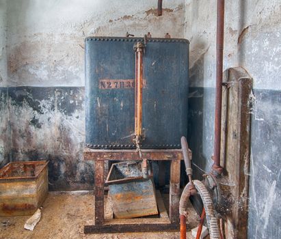 Image of the cellars in an industry building - old abandoned distillery of alcohol