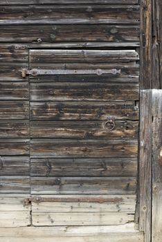 Detail of the old and dameged wooden door