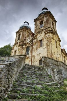 The Church of the Visitation - Skoky.
In the extinct village Skoky - Maria Stock - on-site chapel with miraculous painting of the Virgin Mary was in the years 1736 - 1738 built a large Baroque church - The Pilgrimage Church of the Visitation. Last repaired in the 1903, ruined after 1945. In the early 21st century repeatedly plundered and devastated.