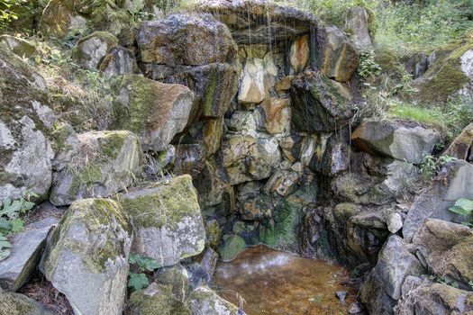 Detail of the mineral water spring - ferruginous water