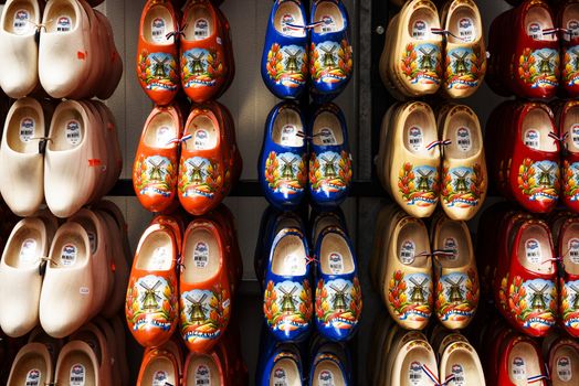 Zaanse schans, Netherlands - July 6, 2016: Many dutch traditional wooden shoes or clogs for sale in shop