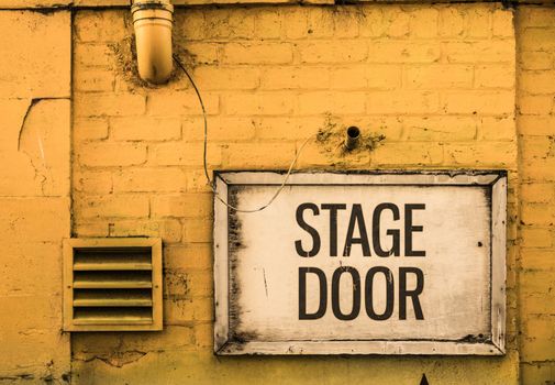 Grungy Stage Door Sign Outside A Theatre