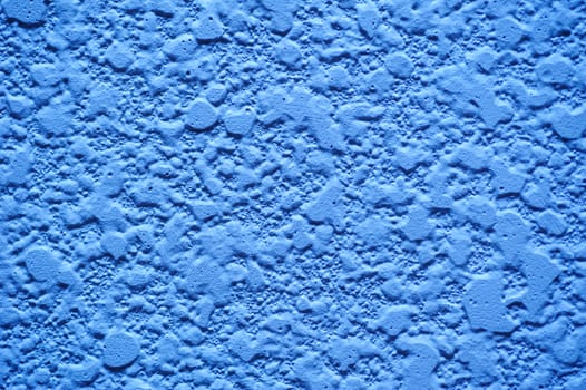Blue texture of plaster on wall for background