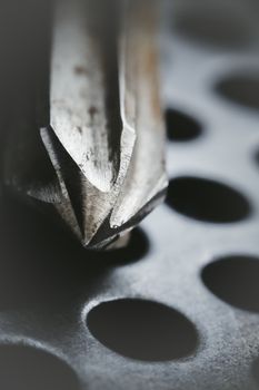 Drill reamer at factory workshop. Selective focus