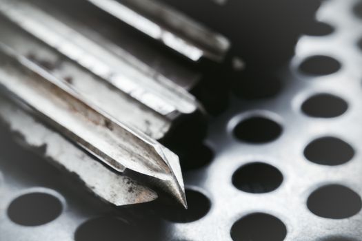 Drill reamer at factory workshop. Selective focus