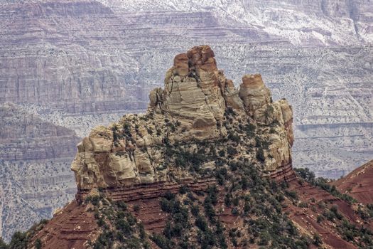 A lone peak in the middle of the Grand Canyon.