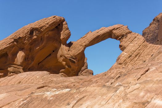 A rock formation shaped like an archway.