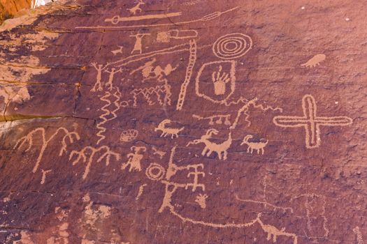 Ancient petroglyphs carved into Atlatl Rock.