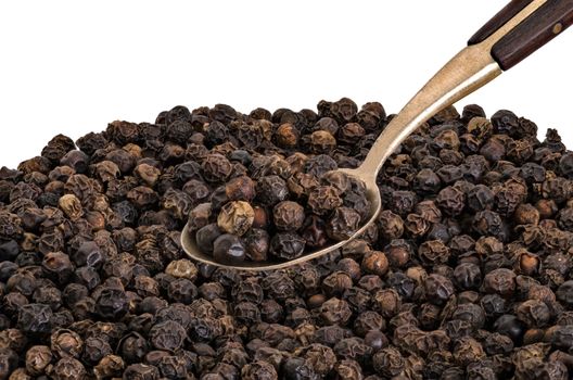 Black Pepper, Whole on Old  Brass Spoon