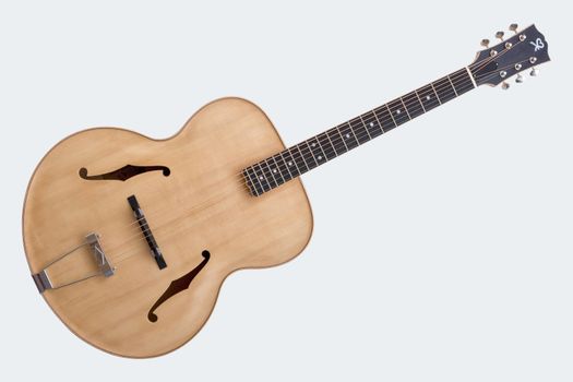 Handmade guitar isolated on a white background