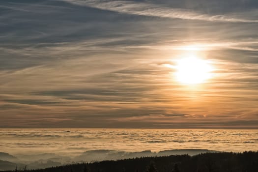 Amazing evening with sunset in Eagle mountains. Beautiful mountain within inversion