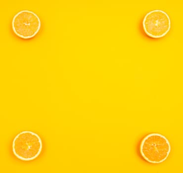 Orange pattern on orange colored background citrus arrangement