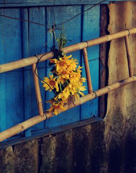 Vintage background with apologize for break up of love, hurt, sorry text and missing, concept from wild sunflower on rustic blue wooden background
