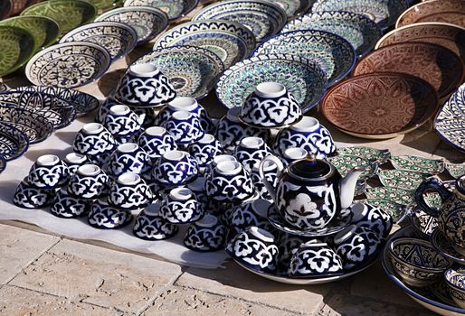 Traditional ceramic dishware in a street market, Uzbekistan