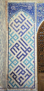 Old Eastern mosaic on the wall of a mosque, Uzbekistan