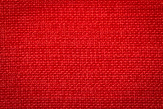 Rustic canvas fabric texture in red color. Square shape