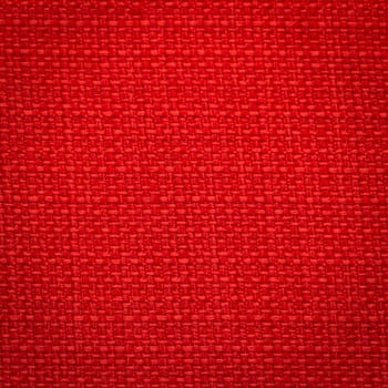 Rustic canvas fabric texture in red color. Square shape