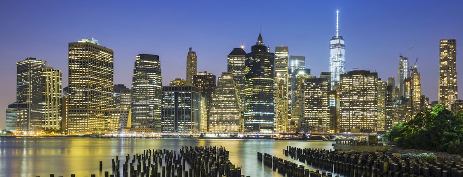 View of New York City Manhattan downtown skyline at dusk, USA. 