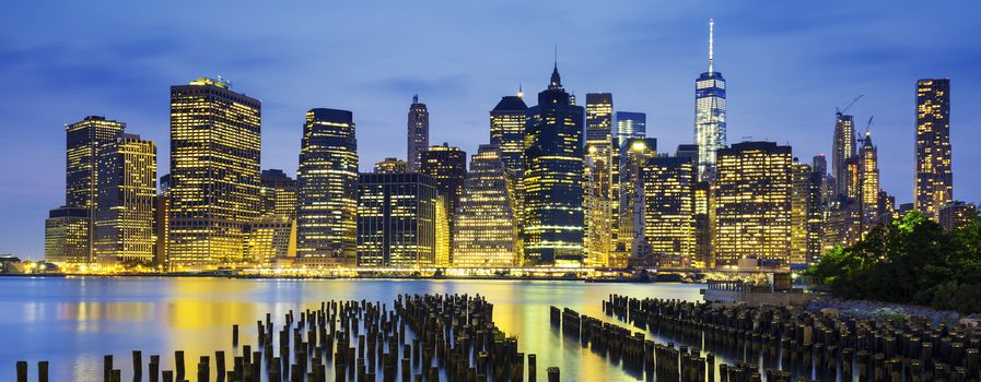 Famous view of New York City Manhattan downtown skyline at dusk, USA. 