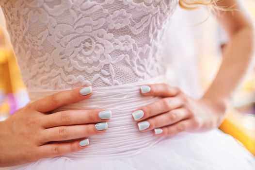 bride with beautiful manicure in wedding day.