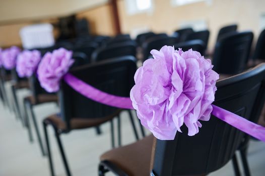 beautifully decorated hall for a wedding ceremony.