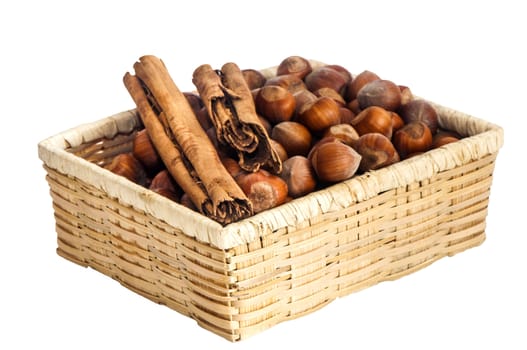 some hazelnuts placed over a white background