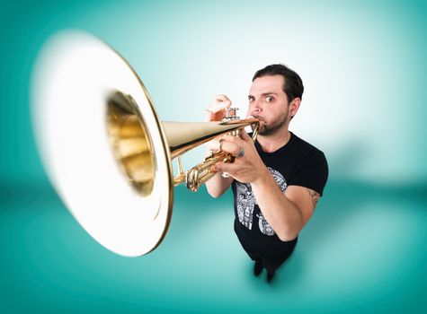 Funny man is playing trumpet