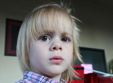 Portrait of cute young  girl with blond  hair