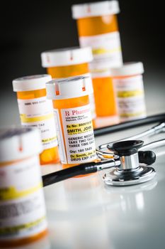 Several Non-Proprietary Medicine Prescription Bottles Abstract with Stethoscope.