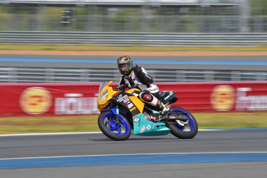 BURIRAM - DECEMBER 4 : Pitin Timaporn with Honda CBR300R motorcycle of CBR300R Thailand Dream Cup in Asia Road Racing Championship 2016 Round 6 at Chang International Racing Circuit on December 4, 2016, Buriram, Thailand.