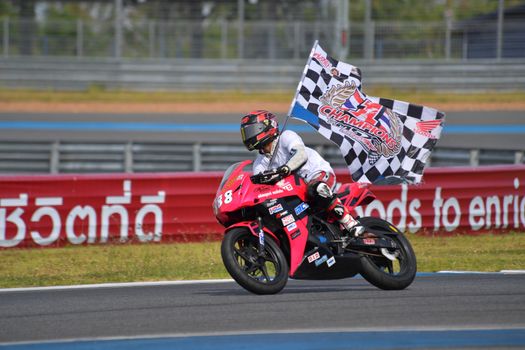 BURIRAM - DECEMBER 4 : Pawit Kumdangsod was championship of CBR300R Thailand Dream Cup in Asia Road Racing Championship 2016 Round 6 at Chang International Racing Circuit on December 4, 2016, Buriram, Thailand.