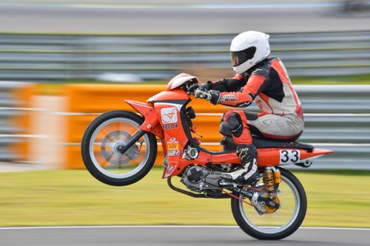 BURIRAM - DECEMBER 4 : Ma Shah Khairil Hisham of Malaysia with Yamaha motorcycle of Underbone 130cc. in Asia Road Racing Championship 2016 Round 6 at Chang International Racing Circuit on December 4, 2016, Buriram, Thailand.