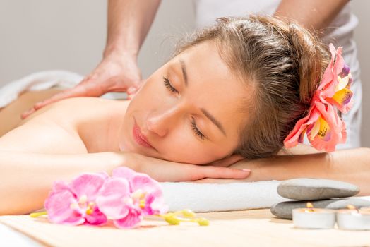 woman enjoys the spa cabinet during the massage