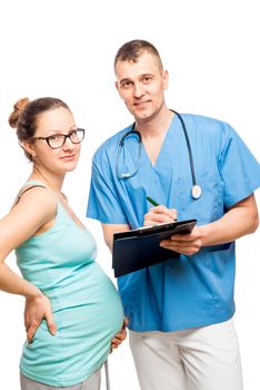 Portrait of a doctor and obstetrician young pregnant mother isolated