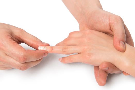 female hands, massage therapist works with the fingers close up