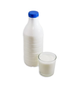 Plastic bottle of milk with blue cap and a glass of milk on a light background
