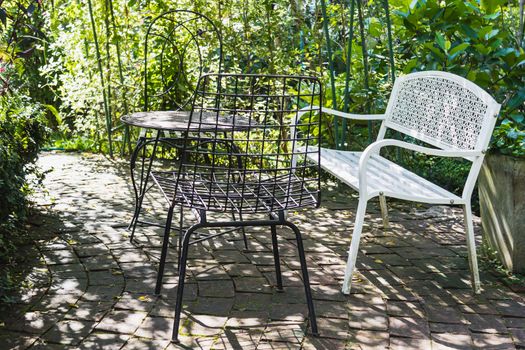 vintage set of table and chairs for outdoors in the garden