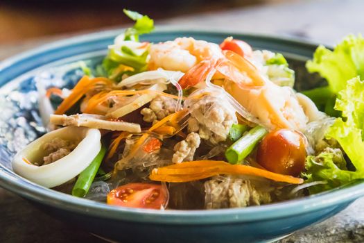 spicy seafood salad with minced pork and vegetable