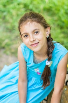 Portrait of a beautiful and happy girl in the Park