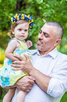 father and little daughter in the Park